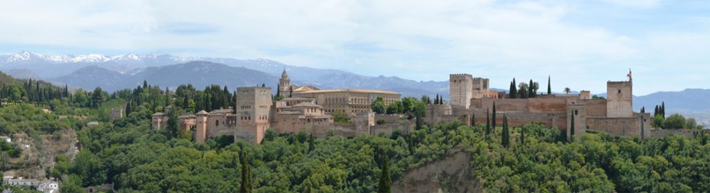 Alhambra Palace with Sierra Nevada mountains in the background