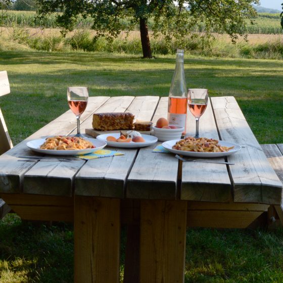 dinner in an orchard with a bottle of Alsace Rose wine