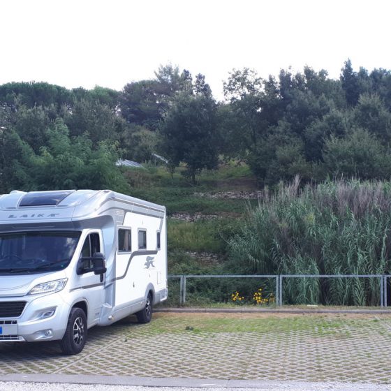 Buzz parked at the motorhome aire in Sasso Pisano near the thermal spring baths