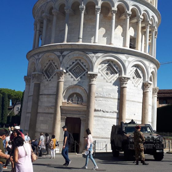 The heavily guarded base of the leaning tower of Pisa