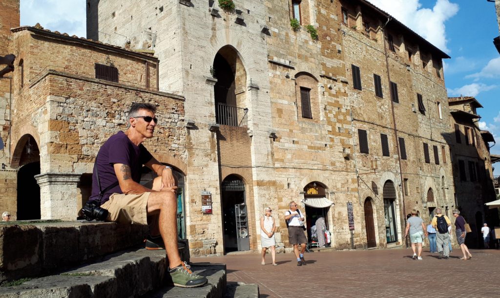 Sitting in the Piazza della Cisterna