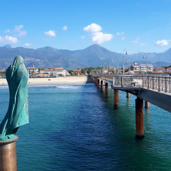 Pier and sea statue at Massa