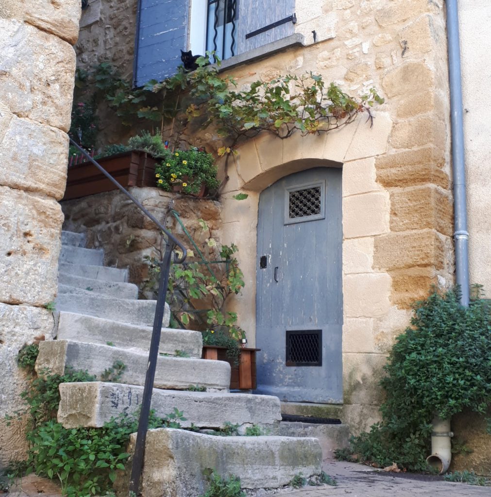 Pretty Jouques house with blue painted door and shutters