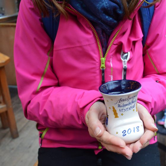 Warming up cold hands with a nice mug of Gluhwein!