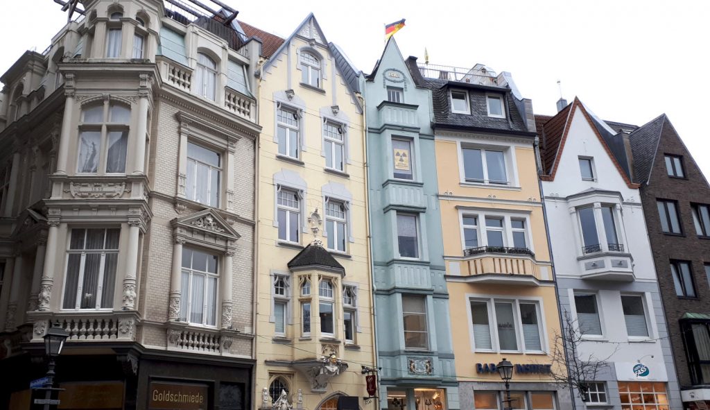 Multi coloured tall buildings in Aachen old city