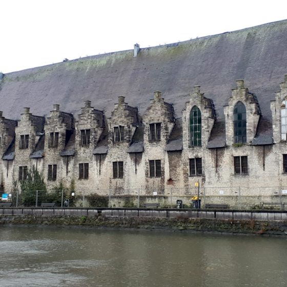 Old buildings lining one of Ghent's canals