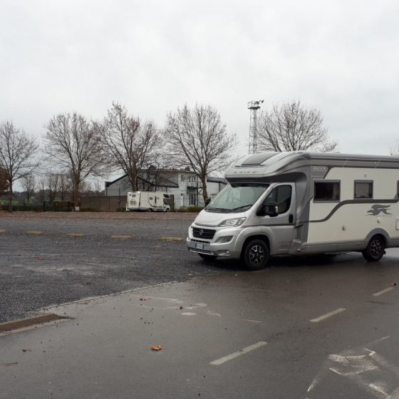 Buzz in the large car park with motorhome bays with full services at the back