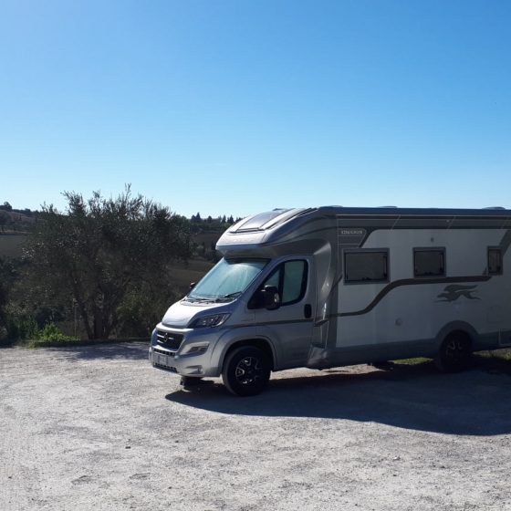 Motorhome aire at the little village of Montechiello in Tuscany