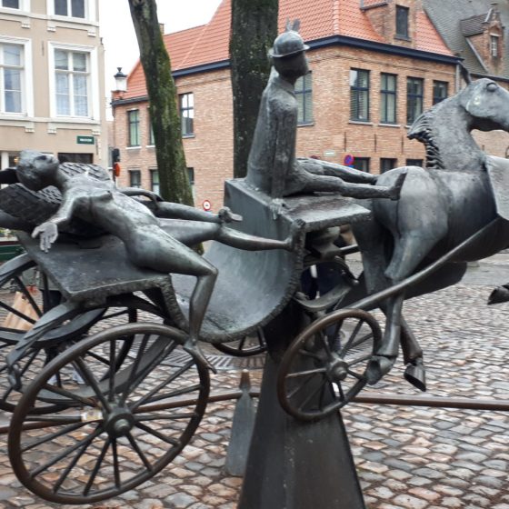 Bruges horse and carriage sculpture