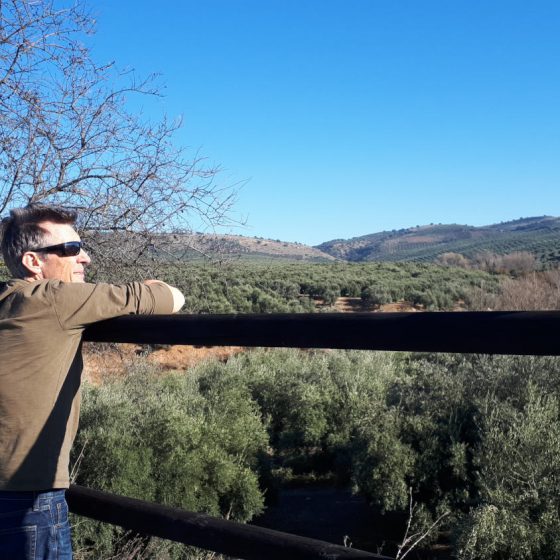 Julian looking across the olive groves in Goat