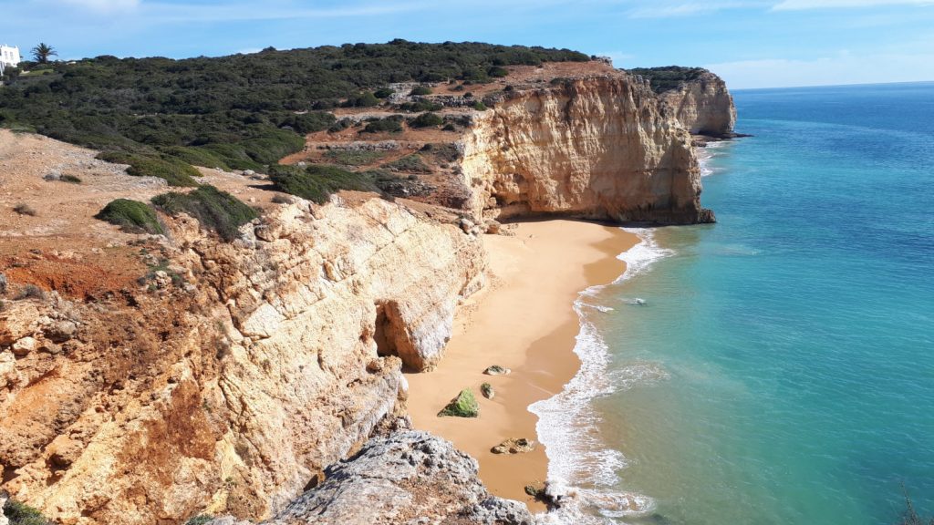 View of Caneiros beach from the cliff top walk