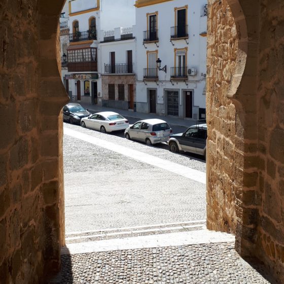 Archway in Marchena with views down the street