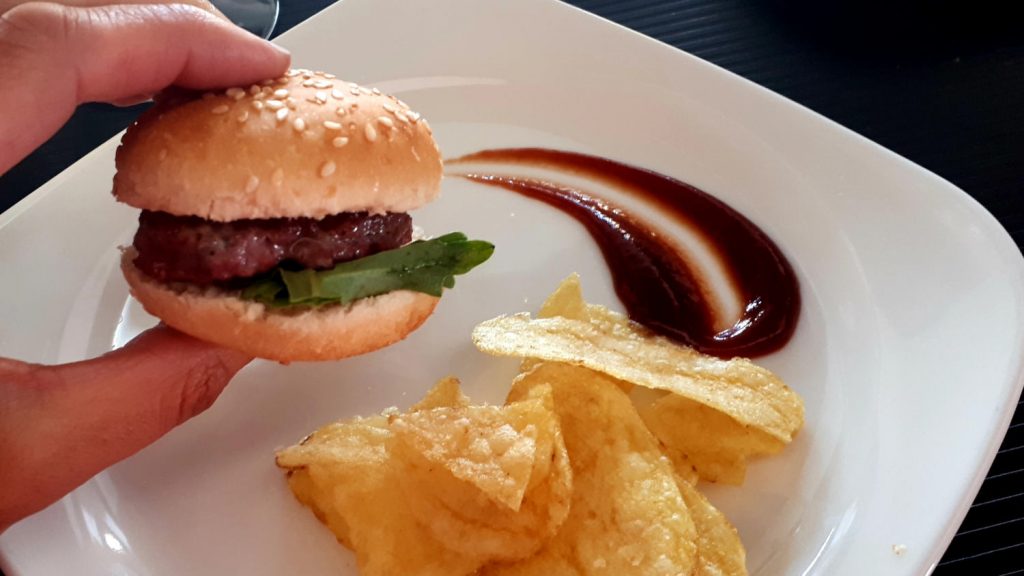 Mini burger tapa with crisps and barbecue sauce