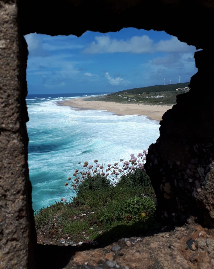 Nazare North beach from the fortress and the frothy white surf