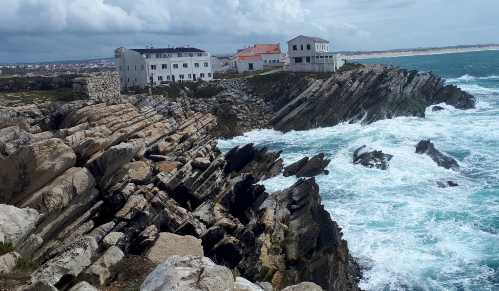 Precariously placed buildings on the leaning rocks