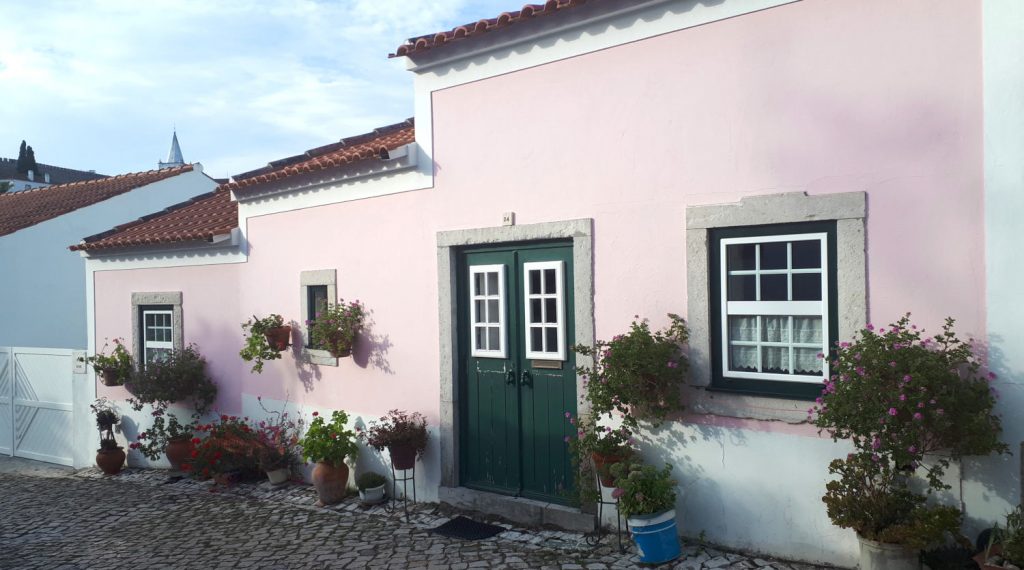 Pretty pink painted house in a quiet part of town