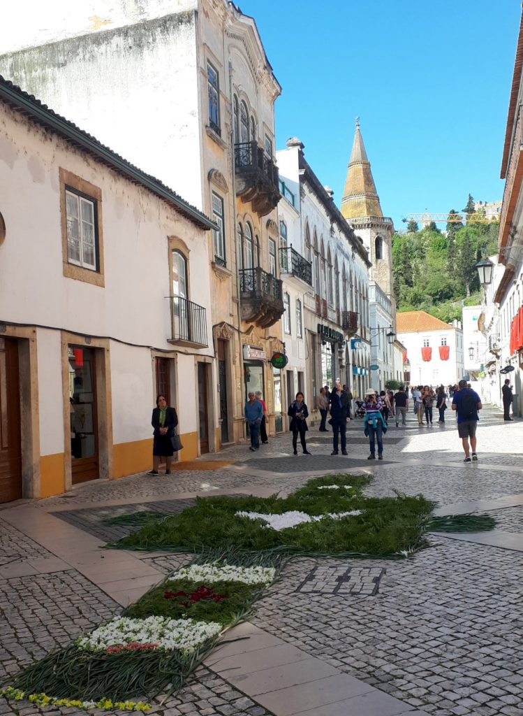 Streets decorated with crosses made of flowers and vegetables