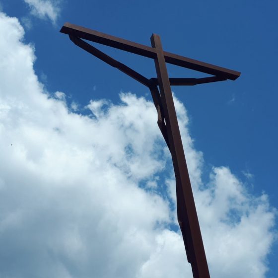 Giant metal cross sculpture