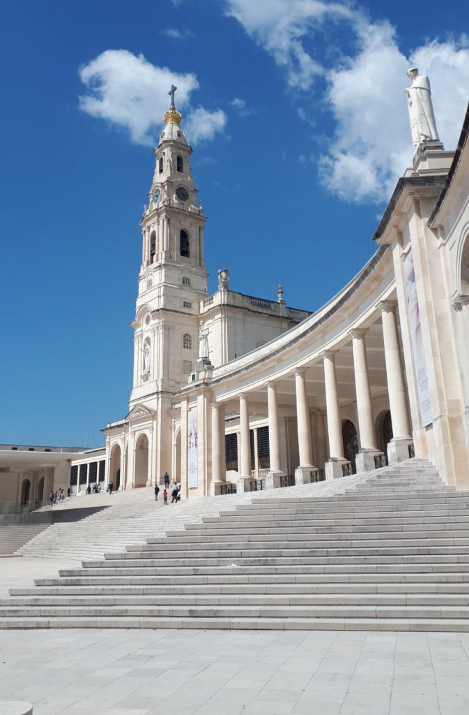 The dazzling white facade and curving features of the Fatima shirine