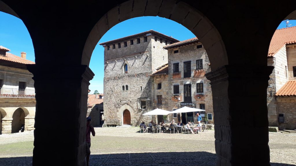 Arcaded facade of buildings in the plaza