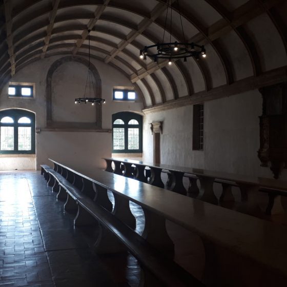 The refectory with huge stone tables