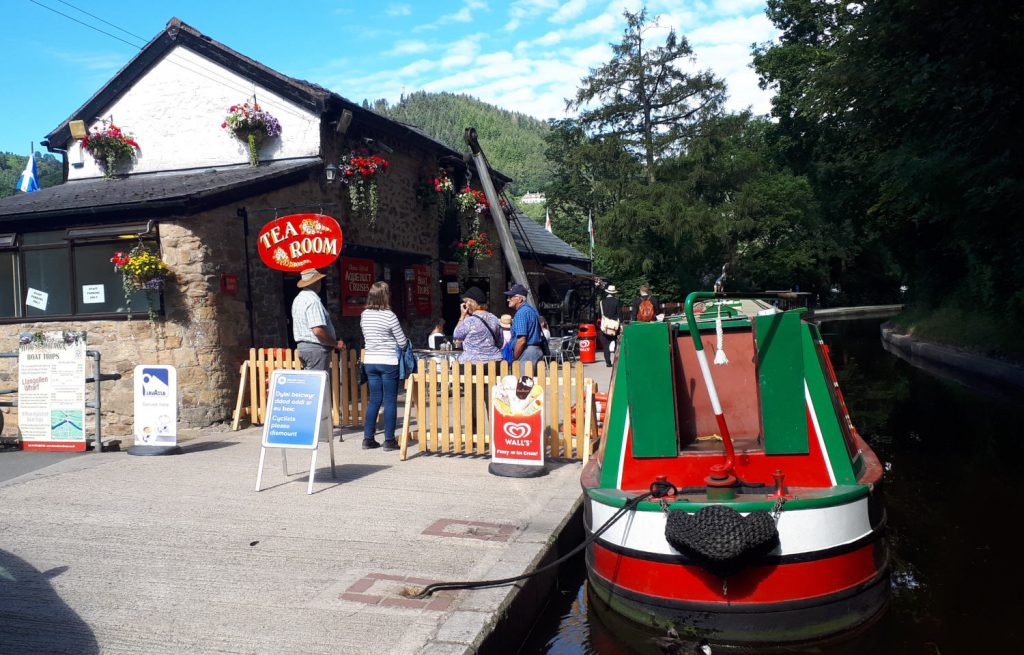 Llangollen canal with tea rooms and horse drawn boats