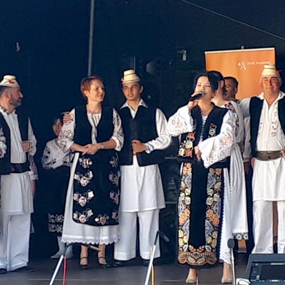 An ethnic singing group on the Town Hall Square