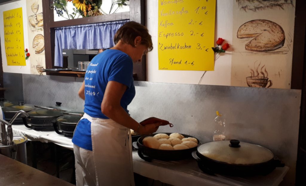 Dampfnudel being steamed in big pots