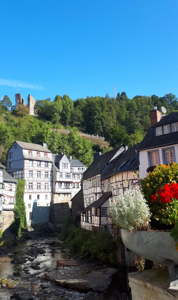 Beautiful Monschau with half timbered buildings lining the river