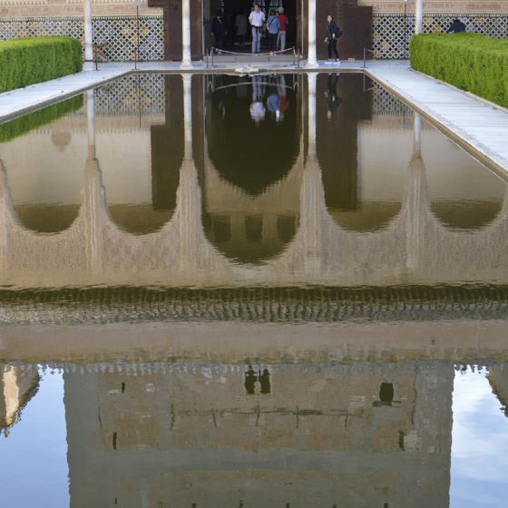 Alhambra reflections in one of the courtyards