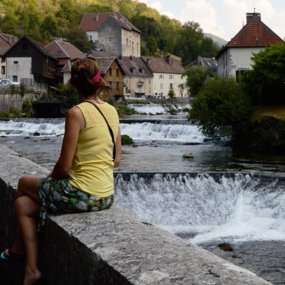 Marcella looking back up river in the beautiful village of Lods