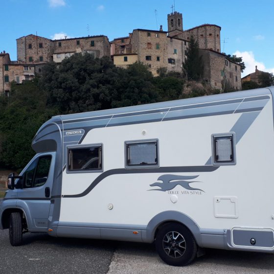 Buzz parked at the motorhome aire in Sasso Pisano near the thermal spring baths