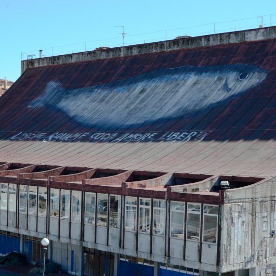 Livorno an old building with giant Fish painting