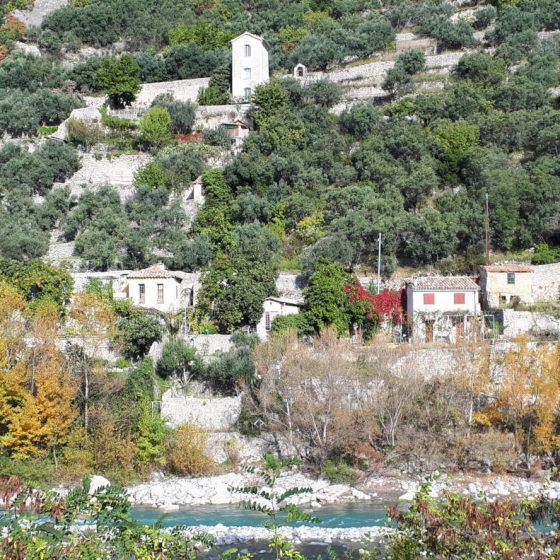 View of houses of Entreveaux across the river Var