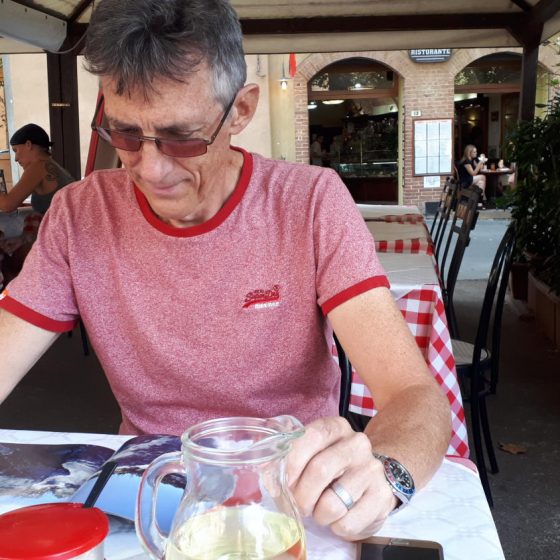 Choosing lunch with a carafe of wine