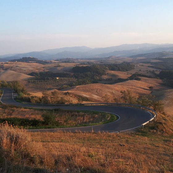 Winding Tuscan roads in the late afternoon