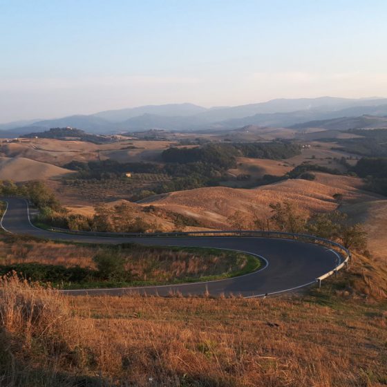 Winding Tuscan roads in the late afternoon