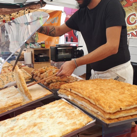 Large focaccia breads in Lucca food market