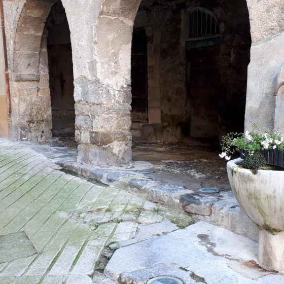 Trading arches and water fountain in Sospel