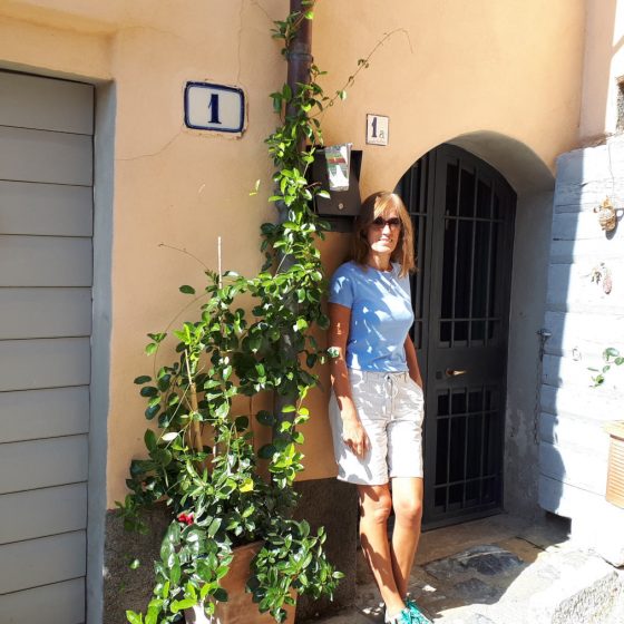 Marcella in a tiny doorway