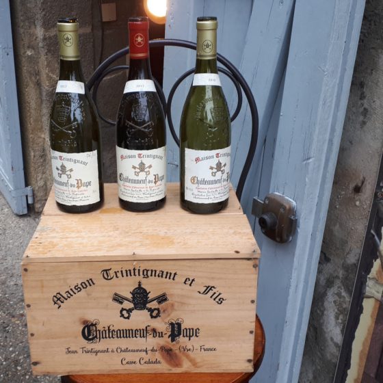 Selection of Chateauneuf-du-Pape wines outside a wine cave