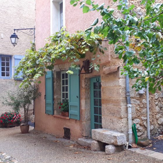 Pastel painted houses in Moustiers-St Marie