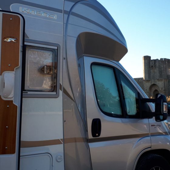 Buzz Laika the motorhome parked outside the walls of Aigues Mortes