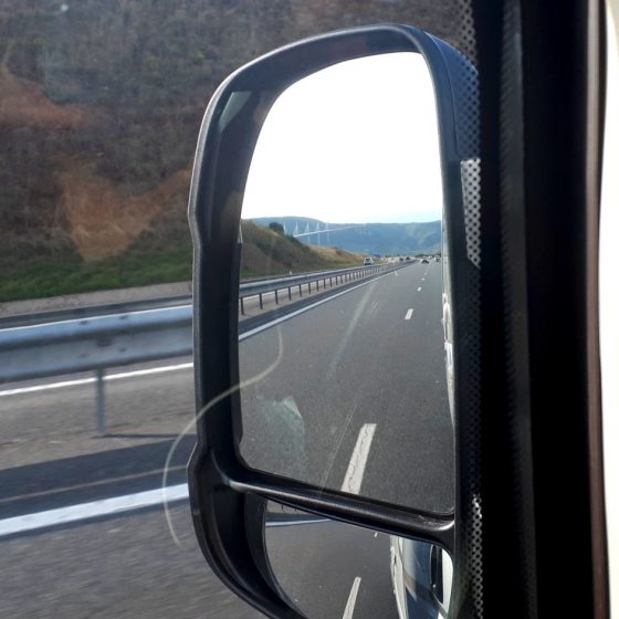 Looking back at the Millau viaduct in the motorhome wing mirror