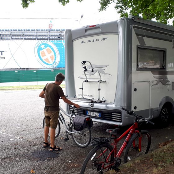 Day and night time parking in Novara football stadium car park