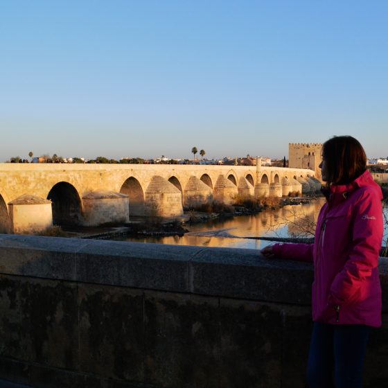 Cordoba Puente Romano with Marcella as the sunsets