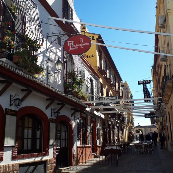 One of Ronda's attractive streets lined with cafes