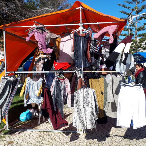 A windy day at the market in Olhau, clothes flying everywhere!
