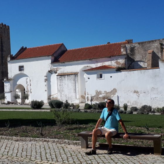 Moura Castle - Julian sitting by Castle