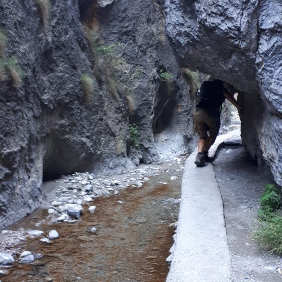 Crouching under the overhang